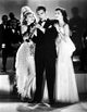 Artie Shaw playing flute with two girls photo print