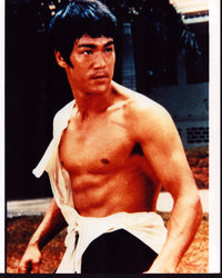 Bruce Lee with ripped shirt in The Big Boss photo print.