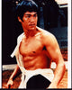 Bruce Lee with ripped shirt in The Big Boss photo print.
