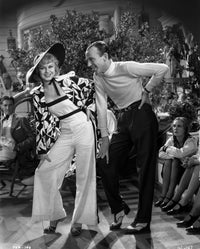 Black and white portrait photo print of Fred Astaire and Ginger Rogers.