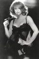 Ann-Margaret lingerie photo print holding a rose