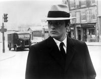 Alain Delon in Le Samurai Photo Print showcasing classic cinema art.
