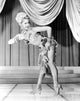 Virginia Mayo bending over photo print, classic vintage Hollywood image.