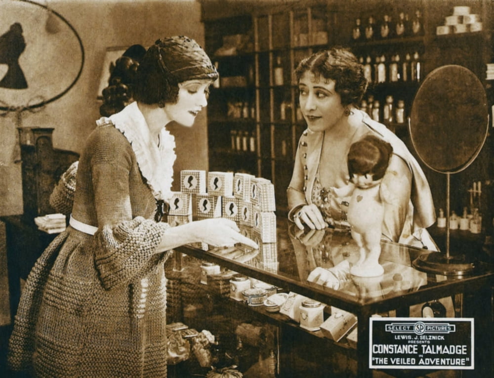 The Veiled Adventure lobby card poster featuring Constance Talmadge from the 1919 movie.