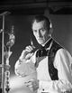 Peter Cushing iconic photo print featuring a syringe in a classic horror scene.