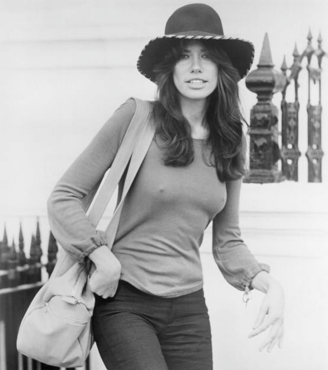 Carly Simon photo print featuring long sleeves and a hat.