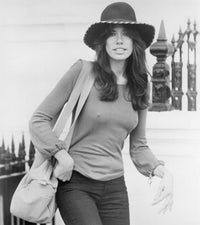Carly Simon photo print featuring long sleeves and a hat.