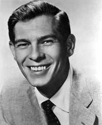 Johnnie Ray posed in suit photo print showcasing vintage music history.