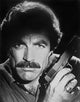 Magnum P.I. close-up portrait with pistol photo print.