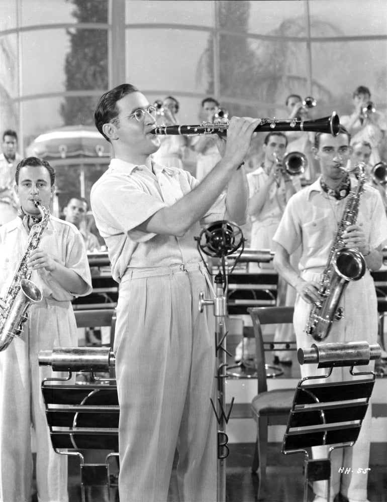 Candid photo print of Benny Goodman with his band, showcasing the vibrant energy of jazz music.