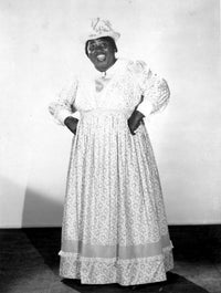 Hattie McDaniel smiling elegantly with hands on waist photo print