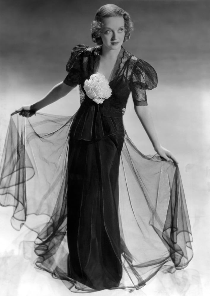 Bette Davis wearing a taffeta gown with black lace bolero jacket photo print