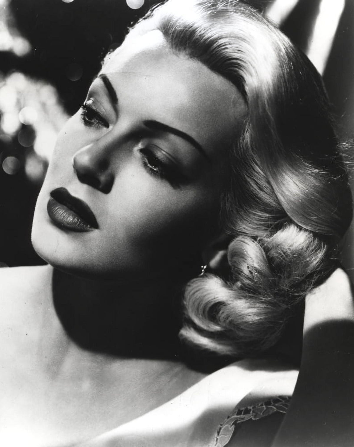 Close-up portrait photo print of Lana Turner in classic Hollywood style.