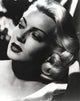 Close-up portrait photo print of Lana Turner in classic Hollywood style.
