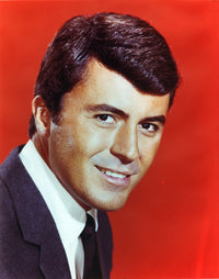 James Darren smiling in black linen suit on red background photo print.