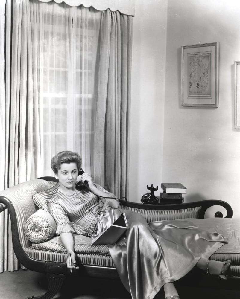 Joan Fontaine answering a telephone vintage photo print