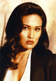 Tia Carrere portrait photo print in black top.