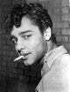 Sal Mineo smoking photo print capturing iconic Hollywood moments.