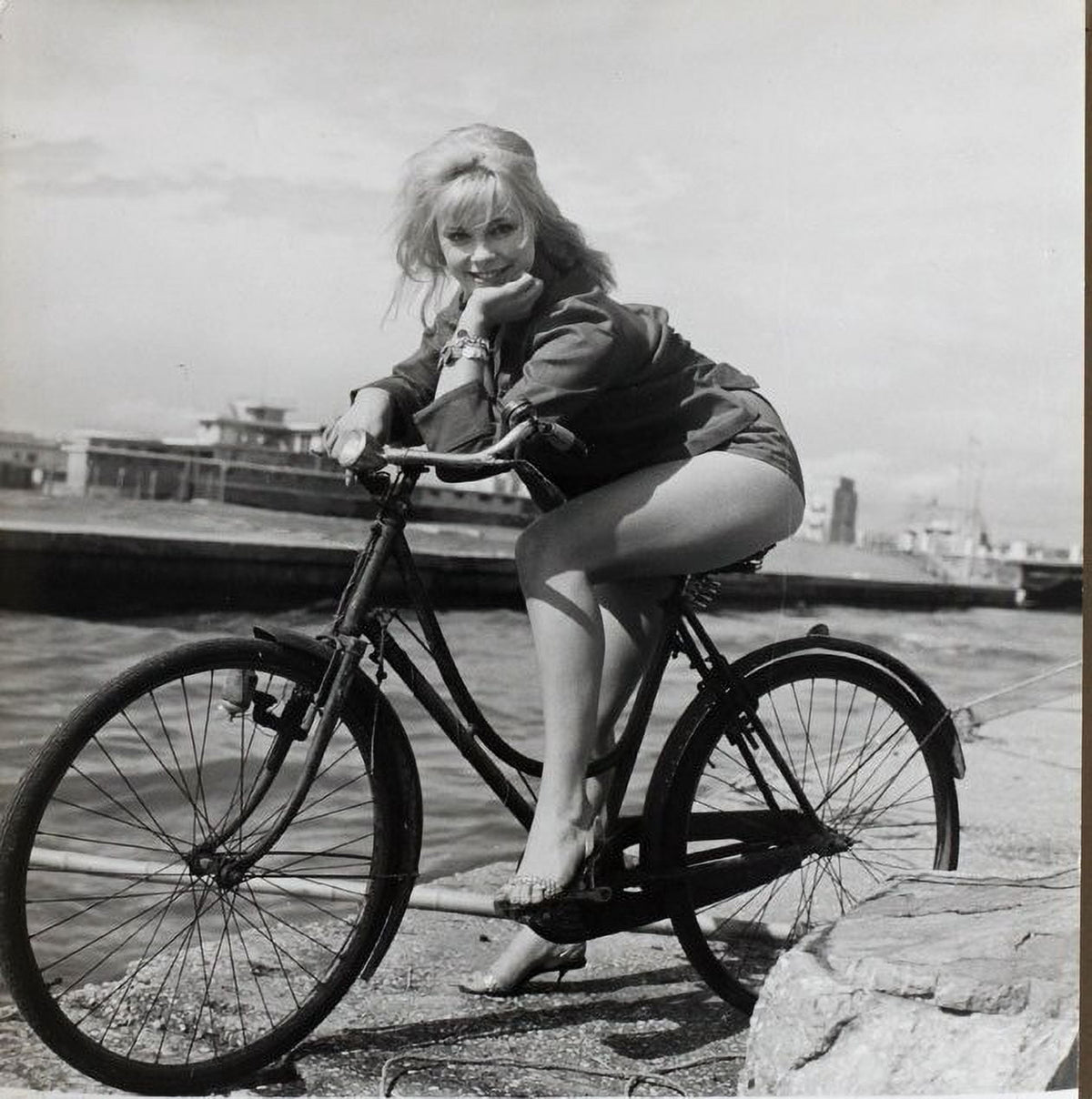Elke Sommer Riding Bike Photo Print - 8x10, 16x20, 24x30