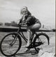 Elke Sommer Riding Bike Photo Print - 8x10, 16x20, 24x30