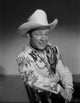 Roy Rogers seated in cowboy outfit photo poster print