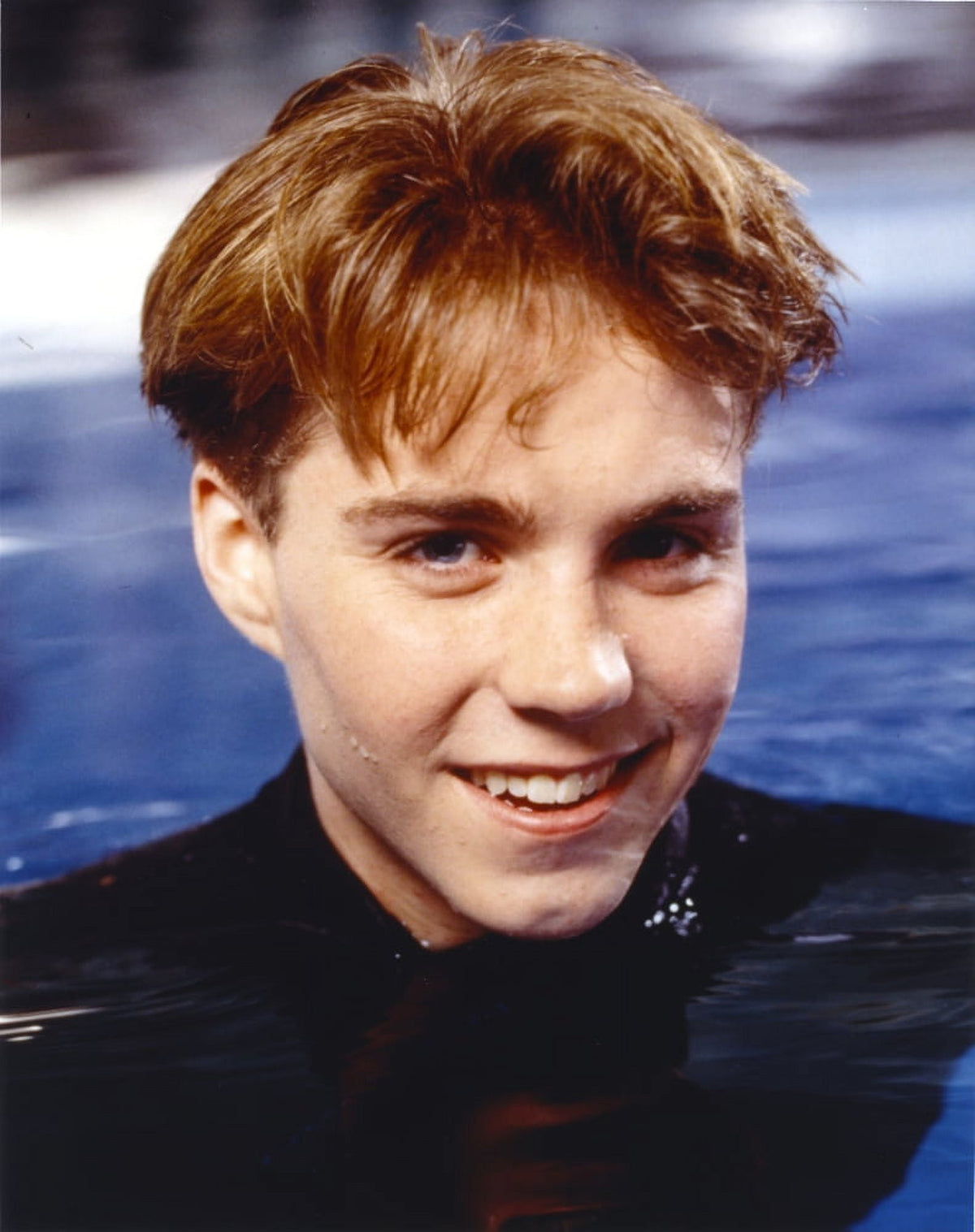 Close-up portrait photo print of Jonathan Brandis swimming in the pool