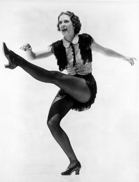 Eleanor Powell kicking photo print showcasing her dynamic dance pose.
