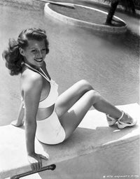 Rita Hayworth seated by the pool photo print