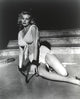 Anita Ekberg classic portrait photo print, seated on floor, cinematic art.
