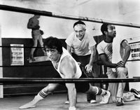 Sylvester Stallone working out in classic movie scene photo print
