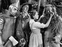 Wizard of Oz photo print of Dorothy comforting the Cowardly Lion.