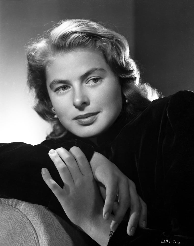 Ingrid Bergman leaning on a couch photo print