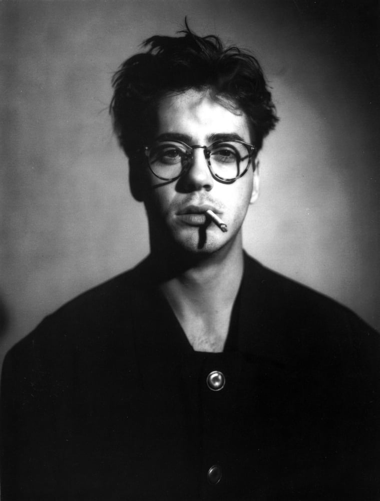 Robert Downey Jr. smoking candid photo print, available in multiple sizes.