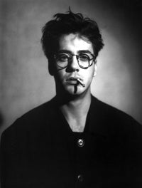 Robert Downey Jr. smoking candid photo print, available in multiple sizes.