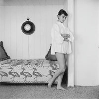 Audrey Hepburn bed photo print showcasing the iconic film star