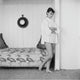Audrey Hepburn bed photo print showcasing the iconic film star