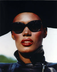 Close up portrait photo print of Grace Jones showcasing her iconic style.