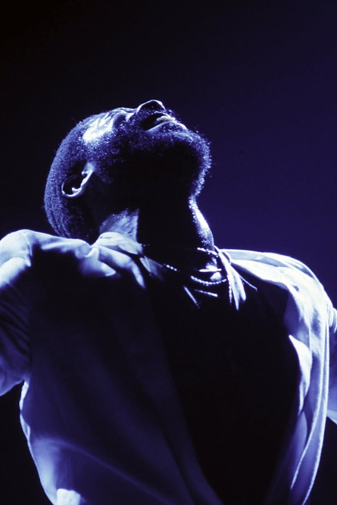 Marvin Gaye performing photo print, available in multiple sizes.