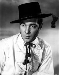 Anthony Dexter posed in cowboy suit photo print, available in multiple sizes.