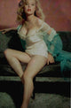 Betty Brosmer Couch Photo Print showcasing vintage beauty.