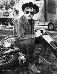 Robert Redford wearing a cowboy hat on a motorcycle photo print.