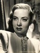 Vintage photo print of Audrey Totter wearing a necklace, showcasing classic Hollywood glamour.