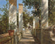 Pergola with Oranges art print by Thomas Fearnley showing vibrant oranges and lush greenery.
