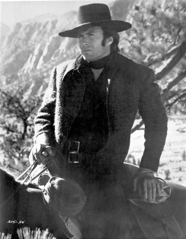 Clint Eastwood posed in black sweater and hat photo print