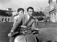 Roman Holiday Movie Poster featuring Audrey Hepburn and Gregory Peck, 1953 classic film.