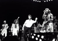 The Bee Gees performing live on stage with John Travolta photo print.