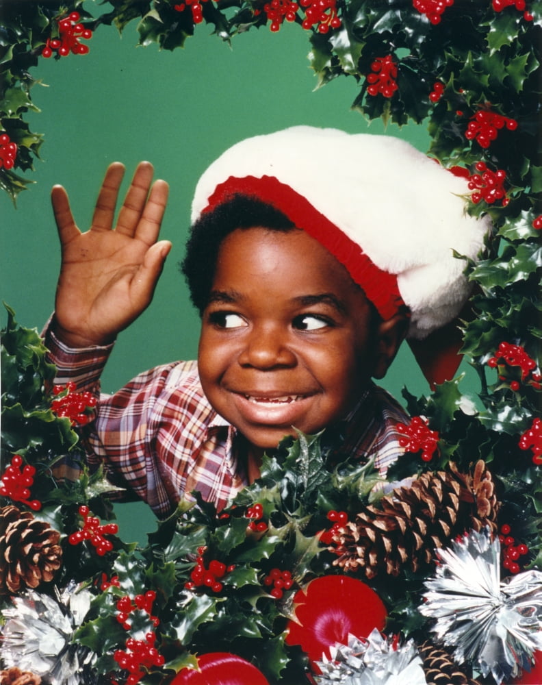 Gary Coleman posed in a green background photo print.