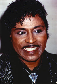 Close-up portrait photo print of Little Richard smiling.