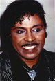 Close-up portrait photo print of Little Richard smiling.