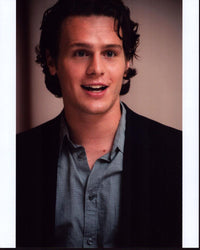 Jonathan Groff photo print in gray shirt and blazer